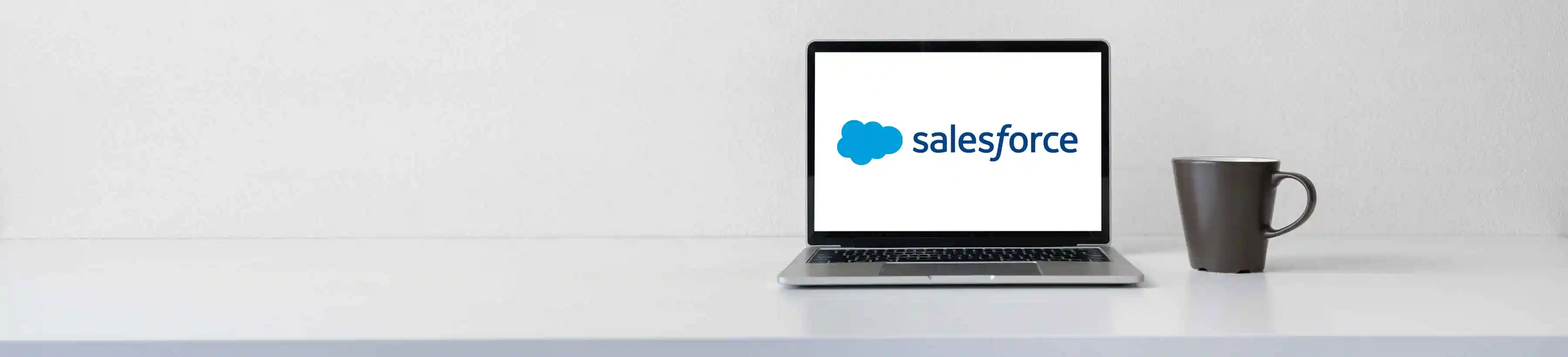 Salesforce logo on a laptop screen